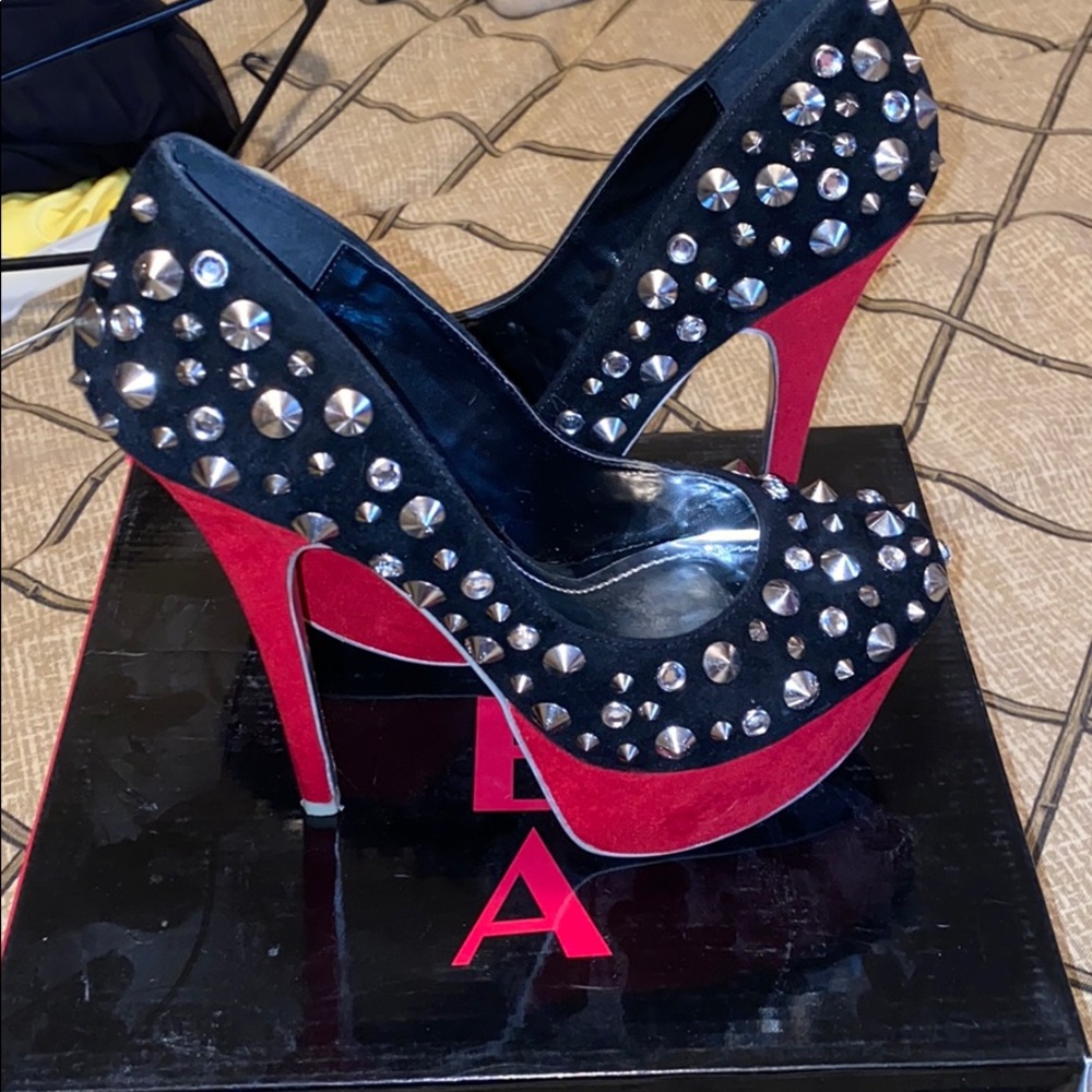 Black and red studded platforms